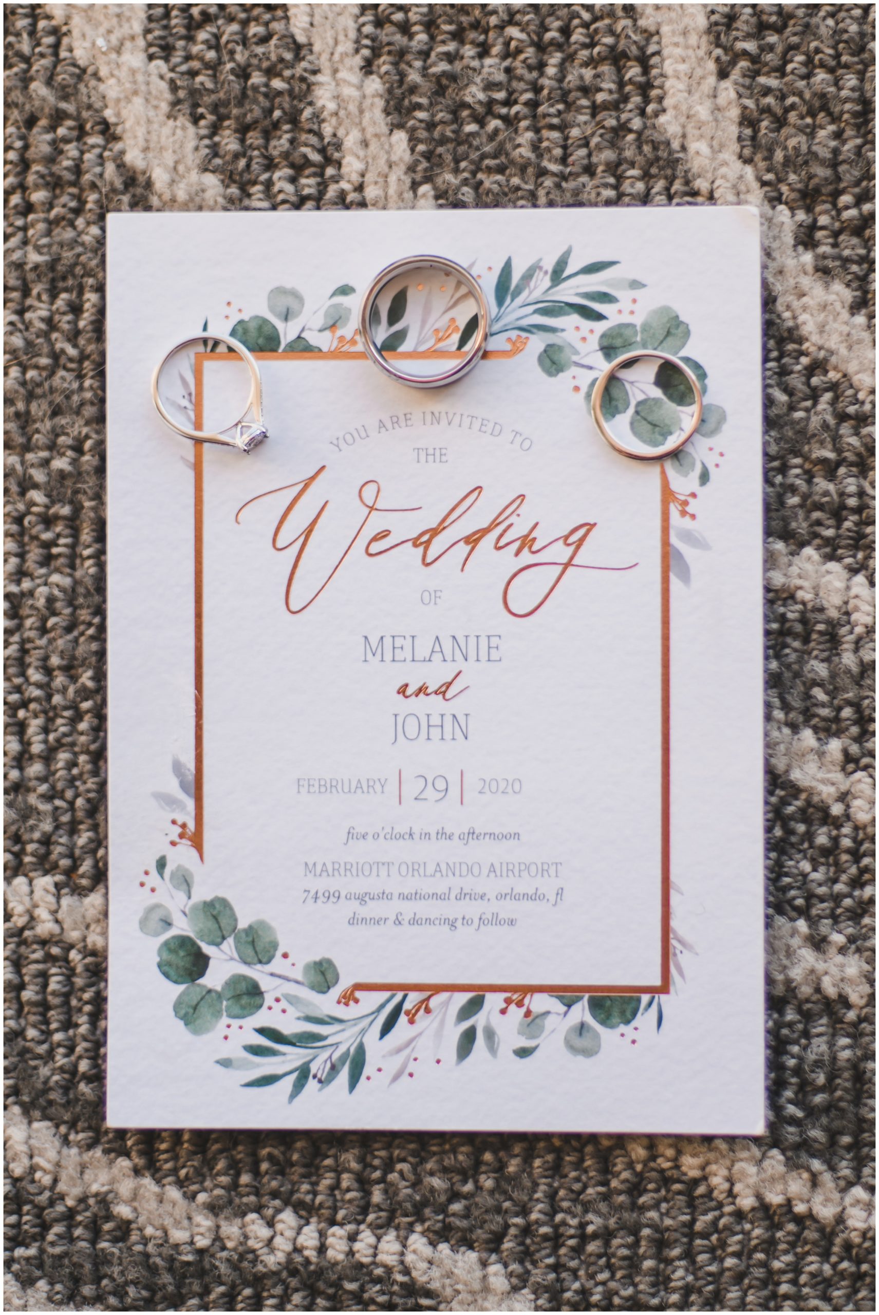 Wedding invitation at a hawaiian themed wedding by the lake at the Orlando Airport Marriott Lakeside