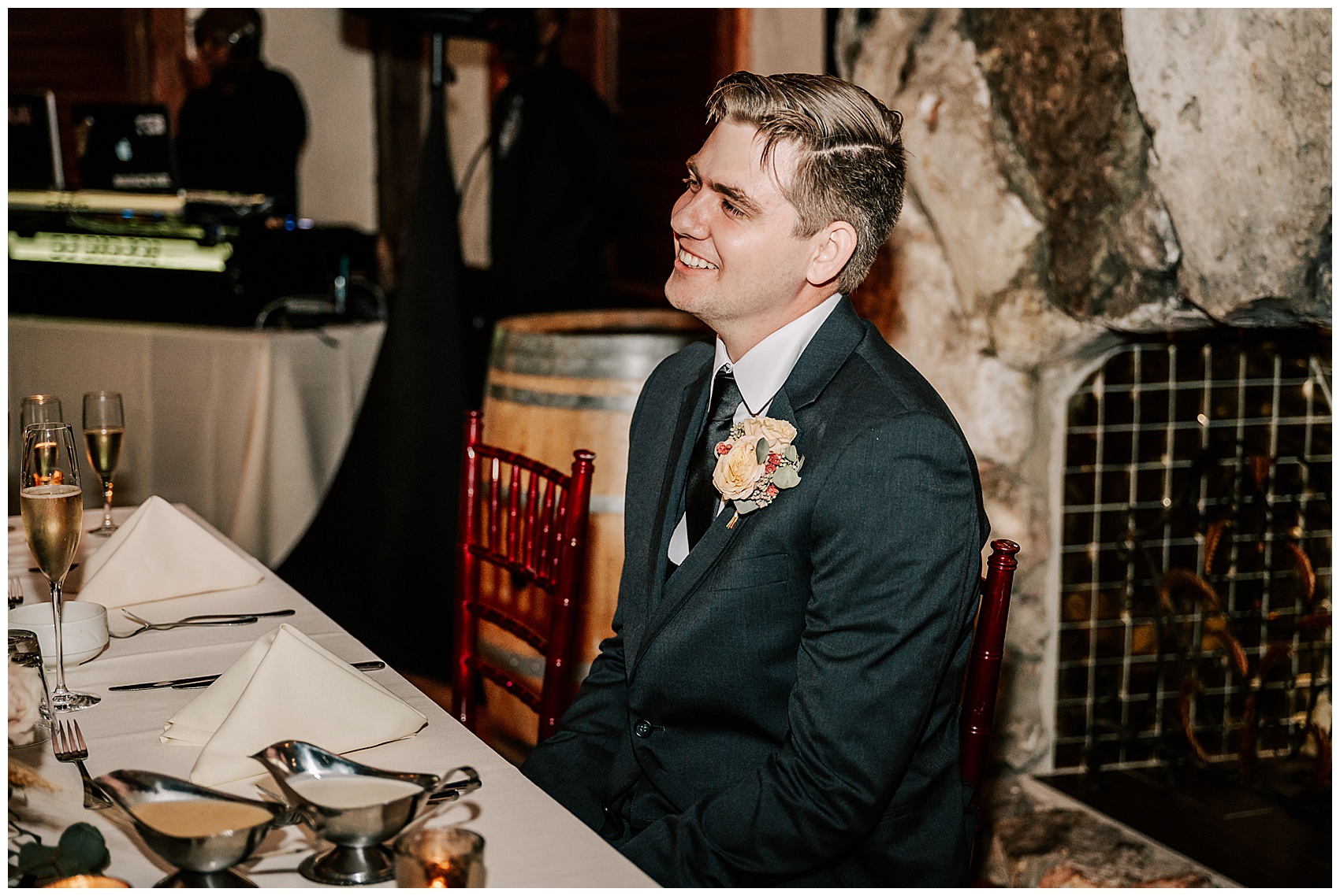 groom laughing at reception at Historic Dubsdread Ballroom wedding