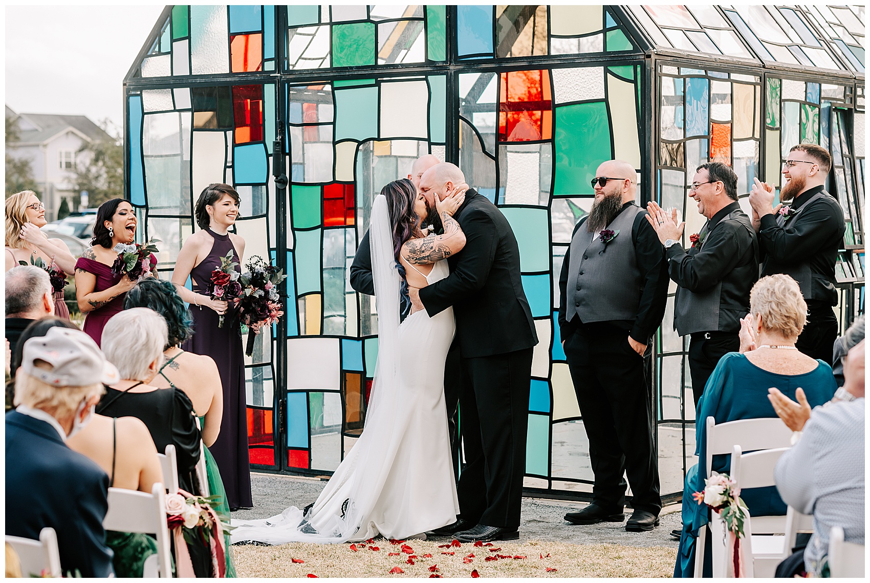 bride and groom first kiss at Canvas Lake Nona Wedding