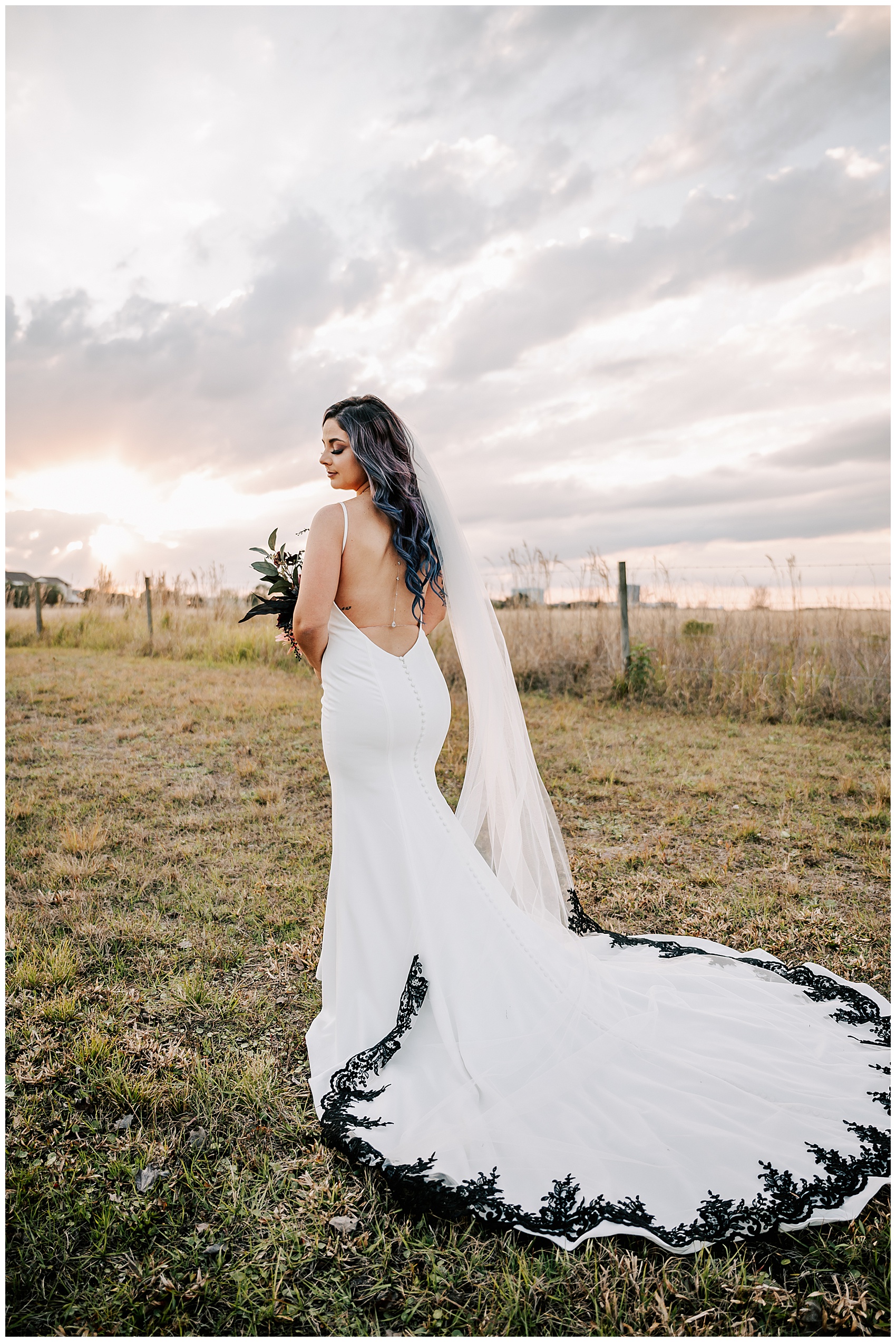 bride with train and veil at Canvas Lake Nona Wedding