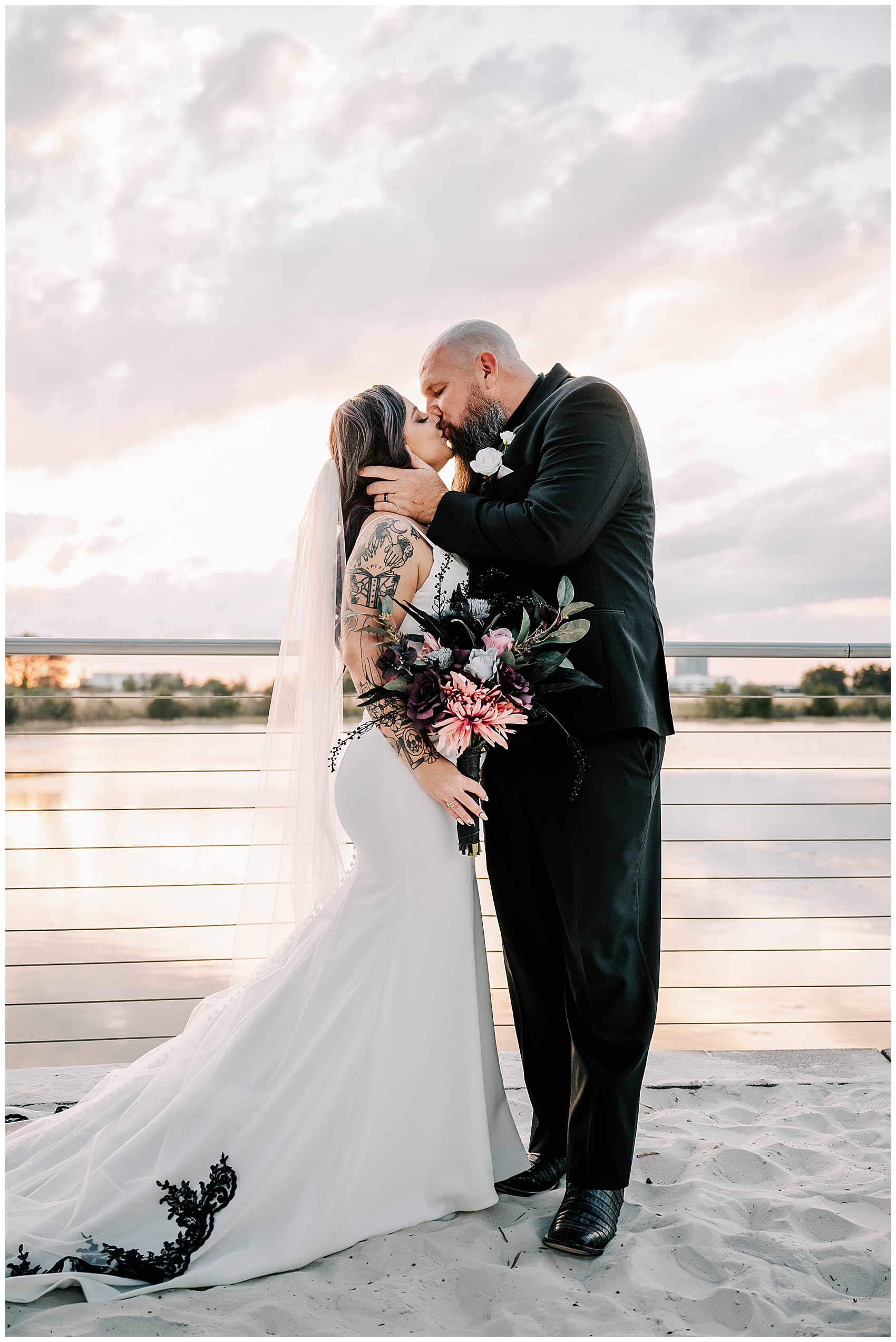 bride and groom share kiss at Canvas Lake Nona Wedding